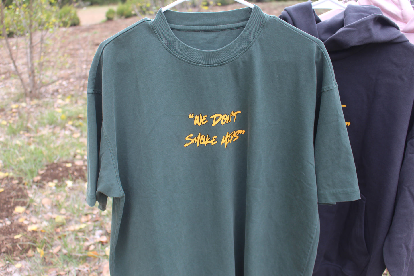 Heavyweight “We Don’t Smoke Mids” Unisex T-Shirt